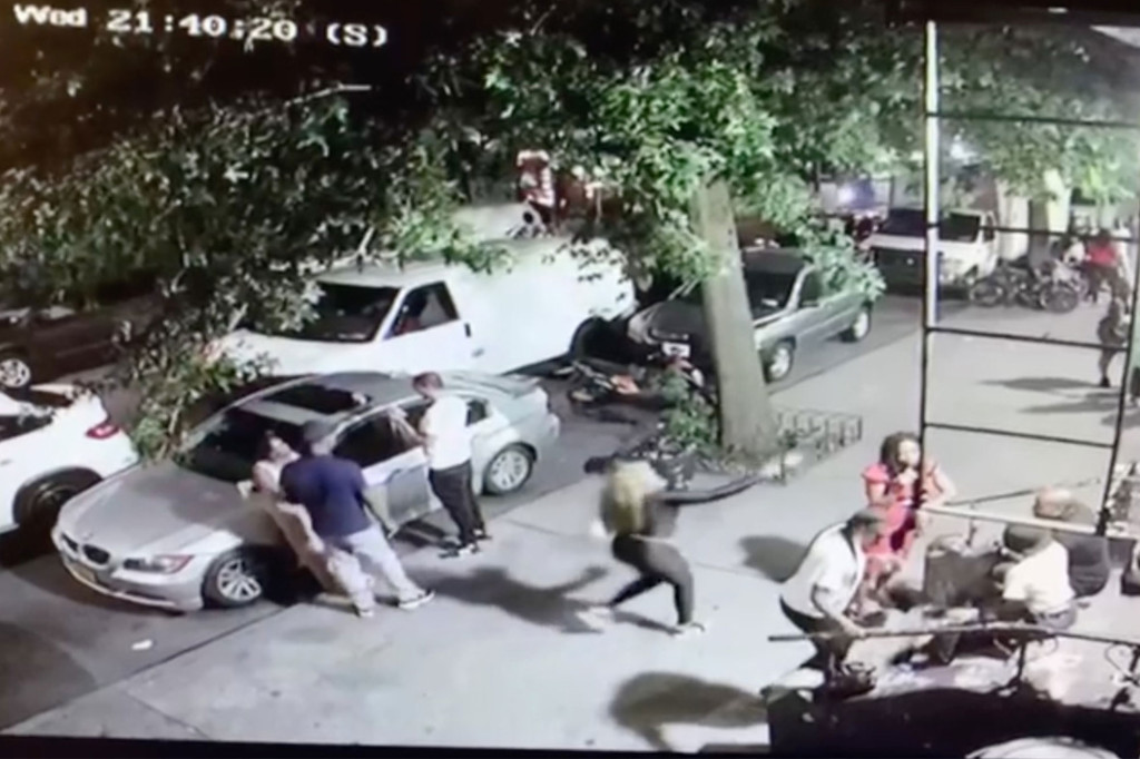 Disturbing video shows woman casually shoot victim dead on crowded NYC street