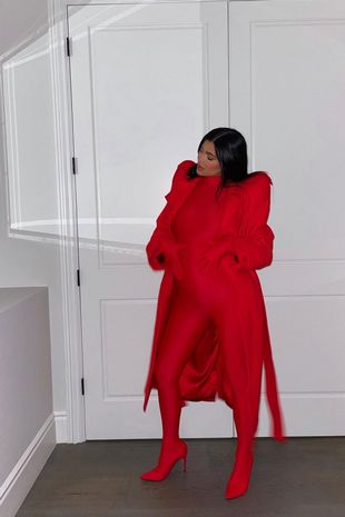 Kylie Jenner displays baby bump as she copies sister Kim Kardashian with edgy catsuit